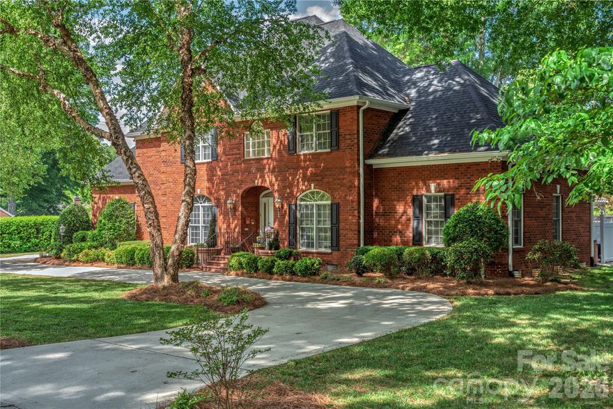 Beautiful custom home on over 1/2 an acre in the established Forest Hills neighborhood. Surrounded by stately homes, it is conveniently located near shopping, dining, and recreation. This spacious home features 3 bedrooms, 3.5 baths and a 3 car garage, with the large primary suite conveniently located on the main level. The main level offers hardwood floors, soaring ceiling in the great room, and a cozy fireplace. The spacious chef's kitchen is perfect for entertaining, complete with a breakfast nook and a separate formal dining room. Upstairs, you'll find 2 large en-suite bedrooms, a separate loft ideal for a flex space, game room, or den, plus ample storage with room for future expansion. Step outside onto the covered veranda overlooking a sparkling in-ground pool, perfect for relaxing or entertaining. A true gardener's dream, the expansive lot offers endless opportunities to create your own outdoor oasis. New roof added in 2026.
