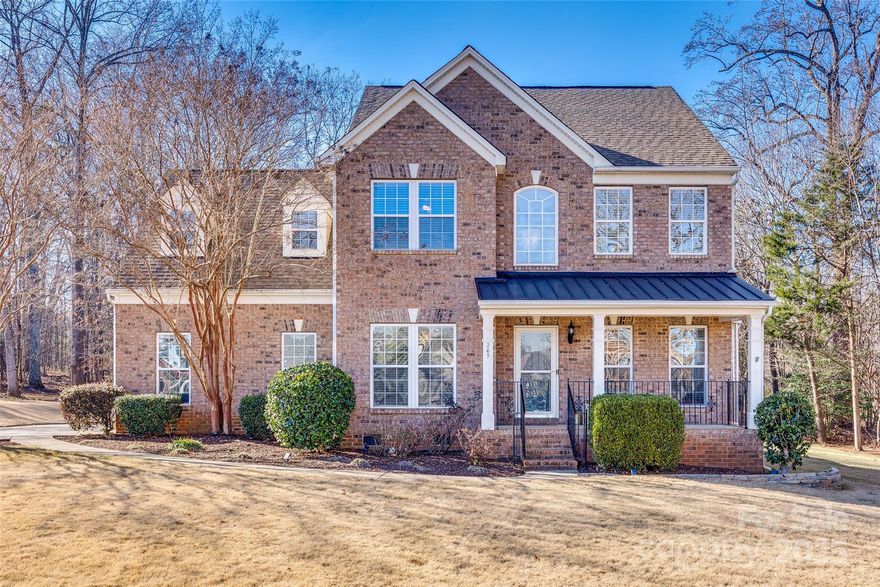 Welcome to your new home in the heart of beautiful Lake Wylie!  This stunning 3-story home sits on a private cul-de-sac, just over a 1/2 acre lot.  Enjoy the comfort of an open living space with the kitchen and breakfast nook that overlooks the living room, a formal dining room perfect for large gatherings. Immerse yourself in the bright, welcoming space adorned with brass fixtures/hardware in the kitchen and beautiful lighting.  Off the living room, sits an additional room that can be used as a playroom, extra office space, library, or reading room.  Exit to the spacious covered screened-in deck overlooking a warm weather oasis with an in-ground pool and fireplace. Spacious primary bedroom on the 2nd floor, 2 walk-in closets & full bath, 3 additional bedrooms and 2nd full bath.  Do not miss the bonus room on the 3rd floor. Approx 1.3 miles from Lake Wylie Marina behind Papa Doc's Shore Club. Roof over back screened-in porch was repaired and replaced after photography was completed.