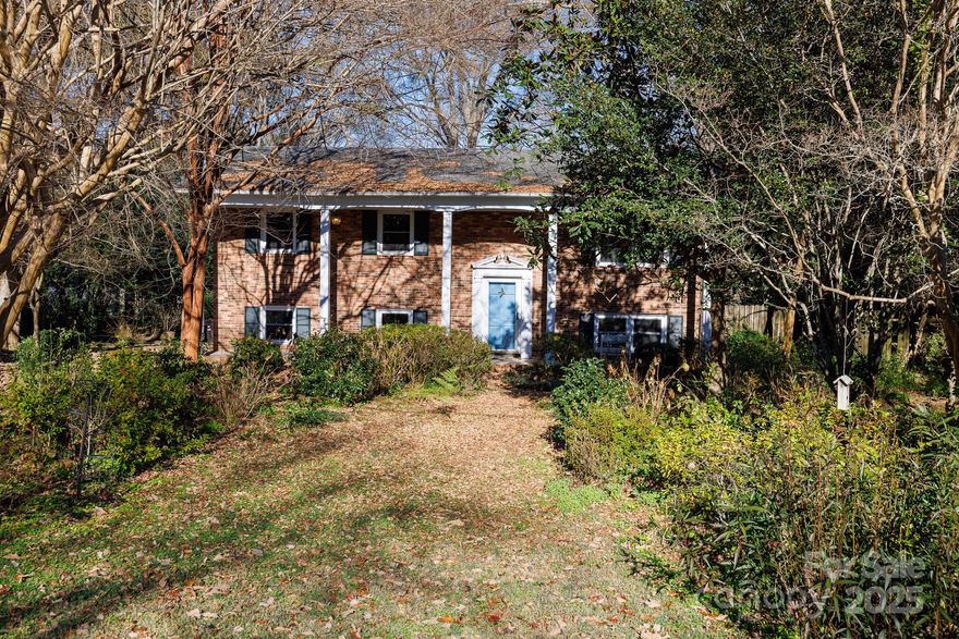 Welcome to an incredible opportunity to customize your dream home in Country Club Estates! This spacious brick, two-story home sits on a generous 0.459 acre lot, offering a wonderful canvas for your vision. The main level features a traditional layout with a living room complete with cozy built-ins, a dining room, kitchen, three bedrooms, and a full bath. The lower level expands your living and entertaining options, boasting a family room with a gas log fireplace, a recreation room with a wet bar, a fourth bedroom, a second full bath, and an unheated workshop/laundry area ready for your organizational touch. Imagine relaxing with your morning coffee on the full-width front porch or hosting gatherings on the massive, enclosed screened porch overlooking the backyard with its convenient storage shed. Built in 1969, this property invites you to bring your creative updates and transform it into a perfectly tailored retreat.  Property sold as is.