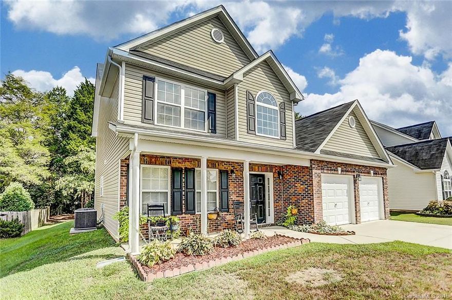 Southern Charmer with a relaxing rocking chair front porch.  Grand entrance to greet your guest in the 2-story foyer with catwalk above.  Sunken den with a gas fireplace is the perfect place to entertain your family & guest. Master suite features a vaulted tray ceiling with separate shower, tub, & walk in closet. Cathedral and vaulted ceilings in the guest bedrooms. Check out the backyard with it's park like setting.  This is an absolute must see.  You will not be disappointed.  Come see today.