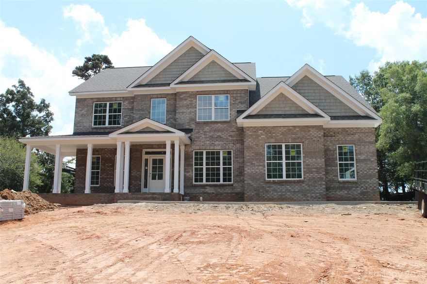 Brand new beauty located in Stonebridge golf course community! This one is a must see! Inviting 2 story foyer, family room with coffered ceiling and fireplace, open to a lovely kitchen with granite counter tops, subway tile backsplash and a peninsula. Also on the main level is a guest bedroom, full bath, dining room and a study. Large Owner's suite features tray ceiling, beautiful bath with tile flooring and shower, granite counter tops, double bowl vanity and a walk in closet. 3 additional bedrooms, huge bonus room and a perfectly appointed laundry room for convenience. Tons of closet space, granite counter tops in secondary baths and just loaded with upgrades. You will love entertaining on the large paver patio, 2 car garage and much more! Builder appliance package includes dishwasher, gas stove and microwave.