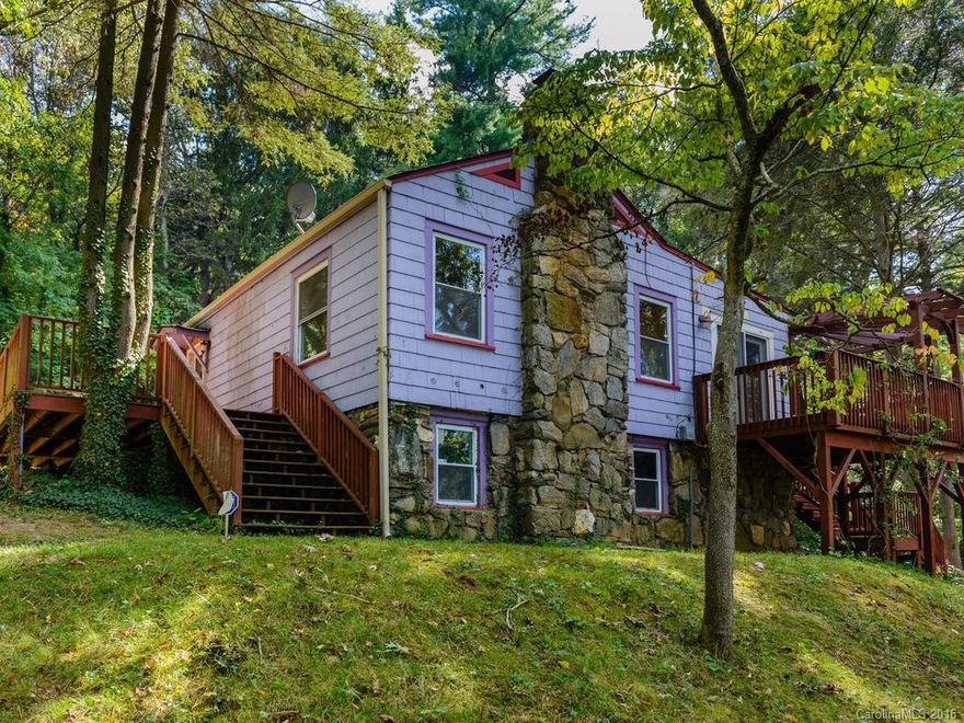 Tucked into Montford is a lovingly restored home that boasts tastefully updated kitchen, perfectly remodeled bathroom, gorgeous timber frame accents, vaulted living room ceiling lined with warm wood, and fresh paint throughout. A studio space is finished in full basement that offers workshop space and storage. Newer appliances,  HVAC, insulation, electrical and plumbing. Sweet separate apartment with kitchenette and full-bath. Large decks and level back yard offer lovely, private outdoor living.