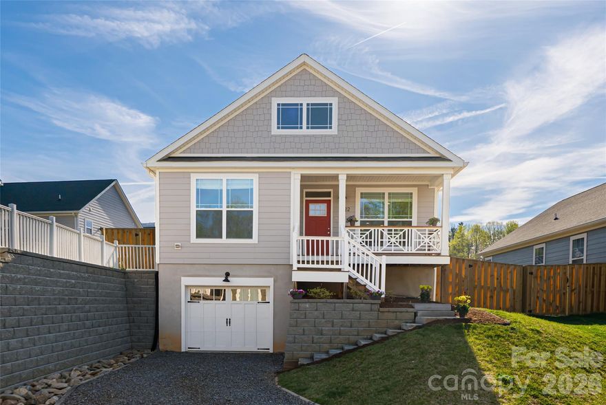 Tucked just under 1.5 miles from the heart of downtown Black Mountain, this like-new 2022 home offers the rare combination of modern construction, thoughtful design, and everyday livability buyers are searching for. From the covered front porch, step into a bright, open living space where natural light, clean finishes, and an easy flow create an immediate sense of comfort. The kitchen is designed to gather around, with generous workspace, modern appliances, and seamless connection to the dining and living areas. Three bedrooms on the main level provide flexibility for guests, a home office, or everyday living, while the overall layout supports true one-level convenience.



Out back, a fully-fenced yard offers privacy and room to relax, garden, or enjoy time with pets. The unfinished walk-out basement expands the possibilities even further, ready to become a home gym, workshop, art studio, or additional living space tailored to your needs. Set within a welcoming community featuring a dog park and community garden, this home delivers a lifestyle that feels both connected and grounded. With close proximity to Black Mountain’s shops, restaurants, and local favorites, and an easy drive to Asheville, it’s an opportunity to enjoy the best of Western North Carolina living in a home that still feels brand new.