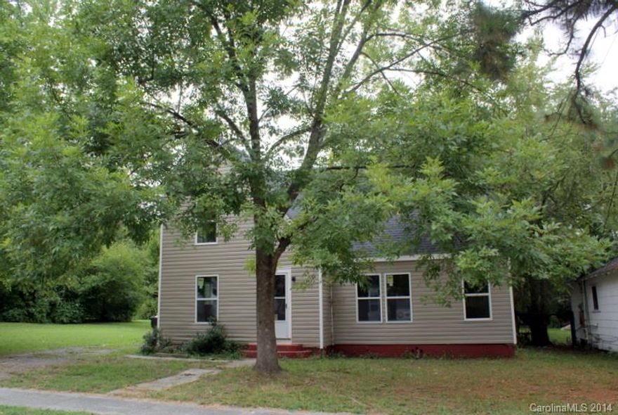This is NOT complete and is sold "As Is". Be sure to drive by this property to see if it is interesting to you, before contacting an agent. Second lot located behind house provides private, level, wooded back yard!  This is an Investment for rental or Section 8 Housing.