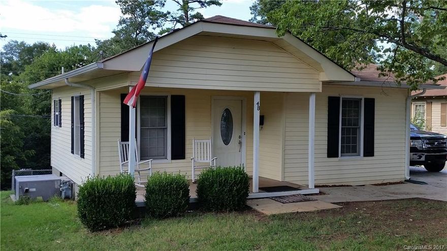 Cute 2 bedroom, 2 bath home in Belmont.  Kitchen has been updated with tile, refurbished cabinets, and counter tops. Per seller, updates include replacement windows, new roof, new gas hot water heater, as well as new HVAC system.  Due to the 6'8" ceilings, the 400 square feet in the basement is not included in the square footage on the listing page.  Basement has 1 bedroom and full bath.