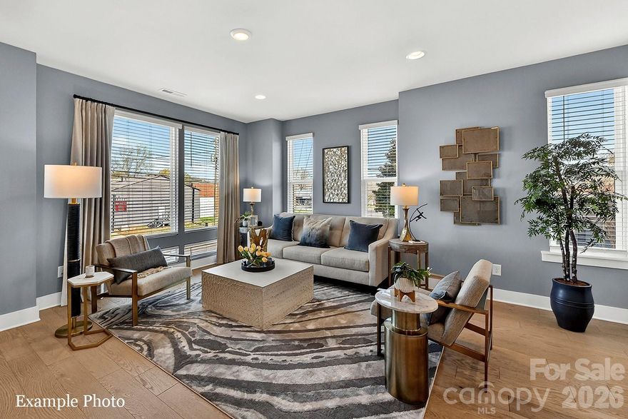 END TOWNHOME UNDER $525,000 JUST OUTSIDE UPTOWN, 3 BLOCKS FROM CAMP NORTH END. SELLER INCENTIVE: Receive up to $13,000 towards closing costs and/or lowering the interest rate! PREMIUM LOCATION, LIVE IN A NEW, BEAUTIFULLY APPOINTED TOWNHOME WITH ROOFTOP TERRACE! Discover Modern Industrial Living at "North End Terraces". A Unique Townhome Community of 69 Homes w/ Modern Design, Artful Architecture & FENCED IN DOG PARK. Nestled between Charlotte's thriving Arts District, NODA, and the bustling Central Business District of Uptown. This home has 3 bedrooms, 3 full and 1 half baths, 2-car attached garage with EV charger and garage door opener. Upscale finishes including LVP floors throughout, plus oak tread staircases. Designer kitchen with white cabinets, upgraded Calacatta Sierra quartz countertops, polished herringbone tile backsplash, deluxe kitchen with stainless steel appliances and hood, including range, dishwasher & microwave. Primary bath features a large, tiled walk-in-shower with tile wet-bed, modern black fixtures, tiled floors in all full baths and more! This home is not to be missed! INVESTORS:NO RENTAL RESTRICTIONS.