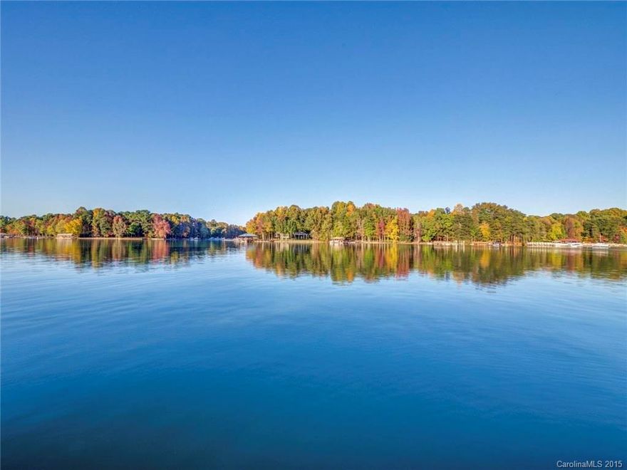 BE WOWED by this LKN WF Estate w/250' of shoreline boasting an amazing stucco/stone exterior & well equipped interior w/stunning features throughout, incld walk out LL to covered patio/pool & spa w/built in fire pit steps away from your own pier & boatslip. Enjoy preparing meals from the gourmet kit open to octagonal keeping area or relax in the 2 story GR or DR. Popular MBR on main w/sep study/office. 4 addt'l lg BRS + bonus rm adorn the upstairs. 2nd kit down, rec rm, media, exercise rm +++