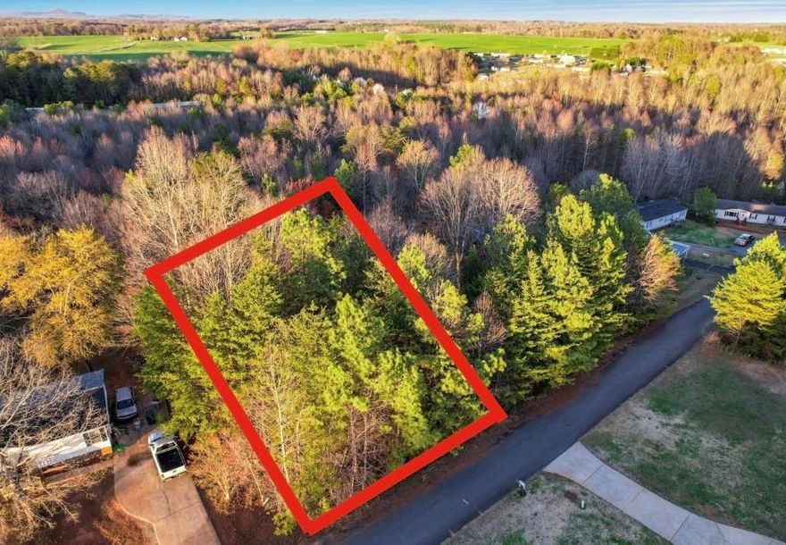 Located right on the Iredell/Alexander county line this .54 acre lot is conveniently located 10 minutes to Interstate 40 with short drives to Statesville, Hickory as well as Taylorsville. The neighborhood has no HOA and no building restrictions. Owner is also selling two additional lots in this neighborhood and would be willing to sell them together!