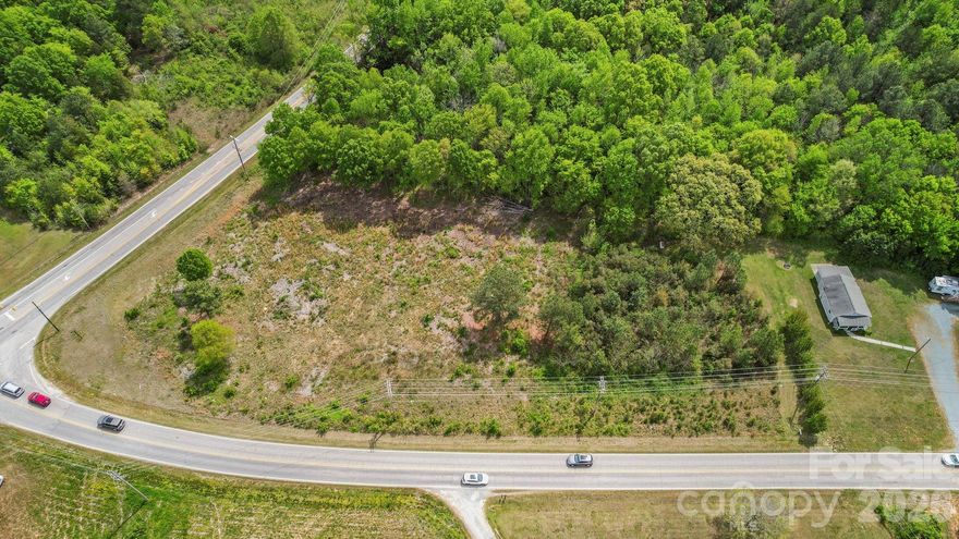 Prime corner lot with nearby access to shops, restaurants and major highways. Minutes to the Monroe Bypass (US-74 Bypass) for easy commuting to Charlotte, Matthews, Monroe, and surrounding areas. Zoning is R-20 with the possibility to rezone to commercial/retail subject to Union County Planning Department approval. Accessible to Union County Water. Fee schedule in attachments.