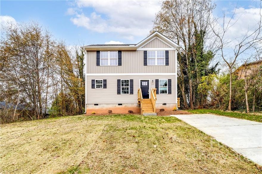 Stylish Hickory home that's move-in ready. 3BD/2.5 BA two-story home with an open floor plan and durable LVP flooring throughout. A beautiful white kitchen with shaker-style cabinets, soft-close drawers, stainless steel appliances, and granite countertops. All bathrooms have LVP flooring, granite countertops, and elongated comfort-height toilets. Exterior highlights include architectural shingles, vinyl siding, a concrete driveway, deck on the side of the house for easy grilling. A corner lot in a great location, minutes from shopping, dining, and golfing. No HOA.