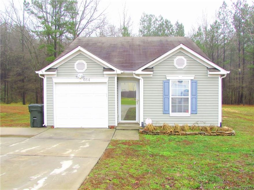 You may take one look at this one and think it's just like every other house on the block, but don't let it fool you! Prepare to be amazed by the absolutely stunning laminate flooring that greets you right as you walk in the door and follows you throughout the open and inviting family room, into the spacious kitchen, and guides you to each of three cozy bedrooms beaming with natural light. This one's got wings, and it's ready to fly! Come see it today before someone else bags this beauty!