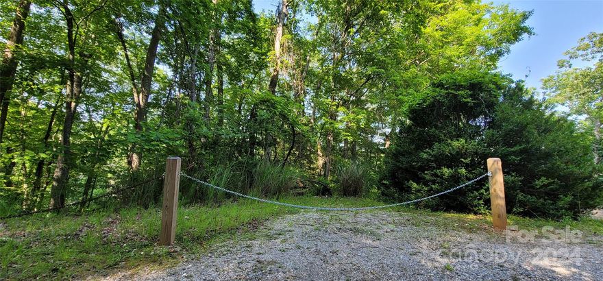 Reduced price with motivated seller! Take advantage of this new, lower price! This beautiful lakefront property spans slightly more than an acre and a quarter, and offers an excellent, expansive view of Deer Park Lake. Located roughly five minutes drive from Spruce Pine Town Center, consisting of three combined lots, all with lake frontage and road frontage. Canoe or kayak directly from your property on the tranquil lake, soak up the sun, or do some fishing!  This fantastic location has already passed a septic perc test and provides an ideal opportunity to construct your home with lakefront access and beautiful views.  Only minutes to shopping, restaurants, breweries, and services in Spruce Pine, the Bare Dark Sky Observatory, Penland School of Art, the Blue Ridge Parkway, Mineral Museum, National and State Forests, pristine rivers for tubing, fly fishing and swimming, waterfalls, Little Switzerland, and the Burnsville Town Square, yet only an hour to Boone/Blowing Rock or Asheville.