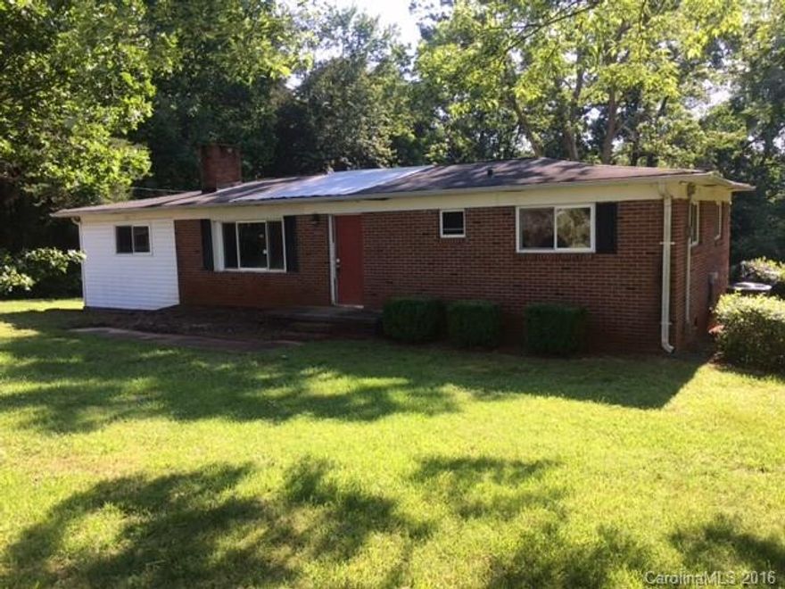 GREAT OPPORTUNITY FOR INVESTORS OR HANDYMAN! This home offers 3 bedrooms, 1.5 baths, a living room with fireplace, spacious bedrooms, an enclosed carport/bonus room, large deck, kitchen with breakfast area and much more. This home does need some TLC. BRING OFFERS!