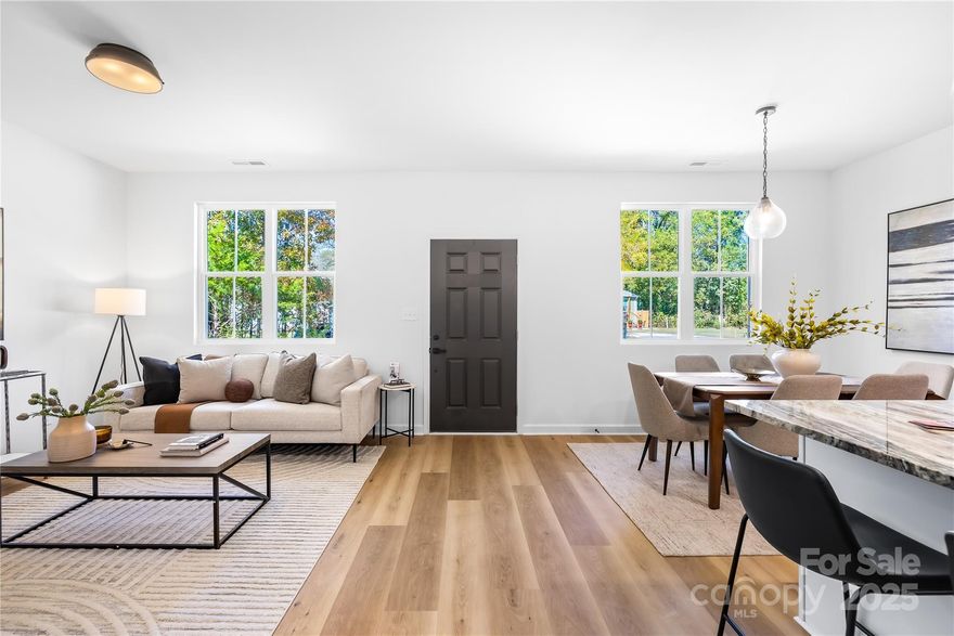 **Seller offering up to $7,500 in Closing costs w/acceptable offer for a limited time!** If holiday expenses have you thinking about waiting to buy, don’t. This seller will contribute up to $7,500 toward your closing costs, which you can apply toward a lower interest rate or simply to reduce your upfront fees. That means you can buy sooner without stretching your holiday budget. You will not find a better deal for a home with this high level quality. Welcome to 251 Baker St. This stylish, new construction home combines comfort, style, and practical luxury. The open floor plan invites easy living and effortless entertaining, centered around a spacious kitchen featuring a large island with a full-bowl sink, stunning granite countertops, stainless steel appliances, and custom lighting that adds warmth and elegance. The primary suite offers a peaceful retreat with a private ensuite bath, custom mirrors, and built-in closet shelving designed for effortless living. Two additional bedrooms provide versatility for guests, family, or a home office, and a dedicated computer niche in the primary suite makes work-from-home days effortless. With thoughtful details at every turn and timeless finishes that elevate the space, this home delivers luxury in a comfortable, modern package. Don’t miss the chance to make it yours!