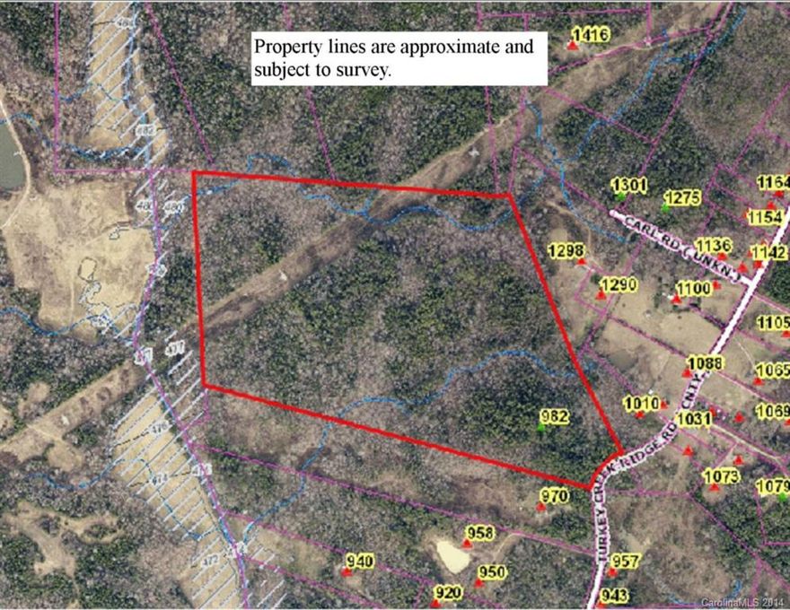 Property has a nice rolling topo and a couple of creeks.  There is a mixture of nice hardwoods and pines throughout.  The land would make a great recreational tract or a very private site for a home.  Property has enough road frontage for someone to put 3 homes on the property.  There are a couple of great pond sites on the property also.