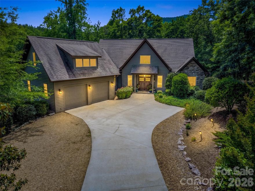 Tucked behind the gates of the prestigious Bright's Creek Golf Equestrian community, this beautifully appointed home is ideally situated on a peaceful cul-de-sac just minutes from the main entrance and amenities. Designed with both comfort and functionality in mind, the thoughtfully crafted open floor plan features a spacious main-level primary suite, offering a private retreat with effortless everyday living. Natural light pours through the expansive living spaces, creating a warm and inviting atmosphere throughout the home. The lower level provides exceptional flexibility with a generous den, two spacious guest bedrooms, and two full baths—perfect for hosting family and friends. Two additional flex spaces are ideal for private offices, fitness rooms, media spaces, or hobby areas, creating endless opportunities to fit a variety of lifestyles. An unfinished lower-level area also offers excellent potential for future expansion, whether envisioned as additional living quarters, recreation space, home gym, or custom retreat. Memberships (available for purchase) to the Bright's Creek Club provide access to an extraordinary mountain lifestyle, including a renowned Tom Fazio golf course, saline pool, multiple dining venues, fitness amenities, scenic hiking trails, tennis, pickleball, and equestrian facilities.