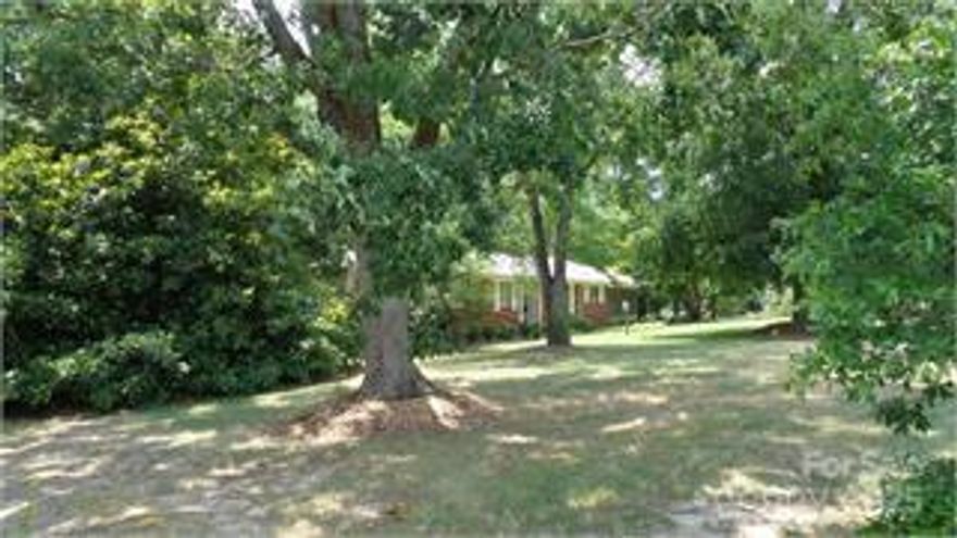 SPECTACULAR OPPORTUNITY - Once in a lifetime chance to buy, currently zoned residential - no HOA.  2 Occupied rental homes (Brick ranch 3 Bedroom, 2 Bath, drive in basement, attached one car garage, central heat and air, brick fireplace, built 1955)  (Frame house, 2 Bedroom, 1 Bath).   One well plus two county water taps at houses.   On this property you will find a 30X36 wood shop with a large attic storage,  a 30X40 two stall barn with feed room and large hay loft and a 20X40 4 bay shed which is near the brick house.  Property being sold "as-is".  This amazing property is located in the Indian Land community, and approximately 1 mile from the new Indian Land High school & adjoins Millstone Creek Subdivision.  (PLEASE DO NOT DISTURB TENANTS) (MUST HAVE APPOINTMENT TO VIEW)