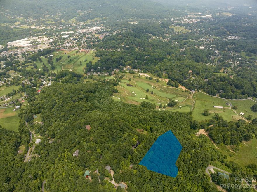 NOW CITY WATER AVAILABLE WITH SELLER PAID WATER TAP WITH NO CITY TAXES!! 
Great lot with fantastic potential views in desirable Waynesville location. Close to shopping and restaurants with easy access to downtown Waynesville and all the area has to offer. Very peaceful setting!