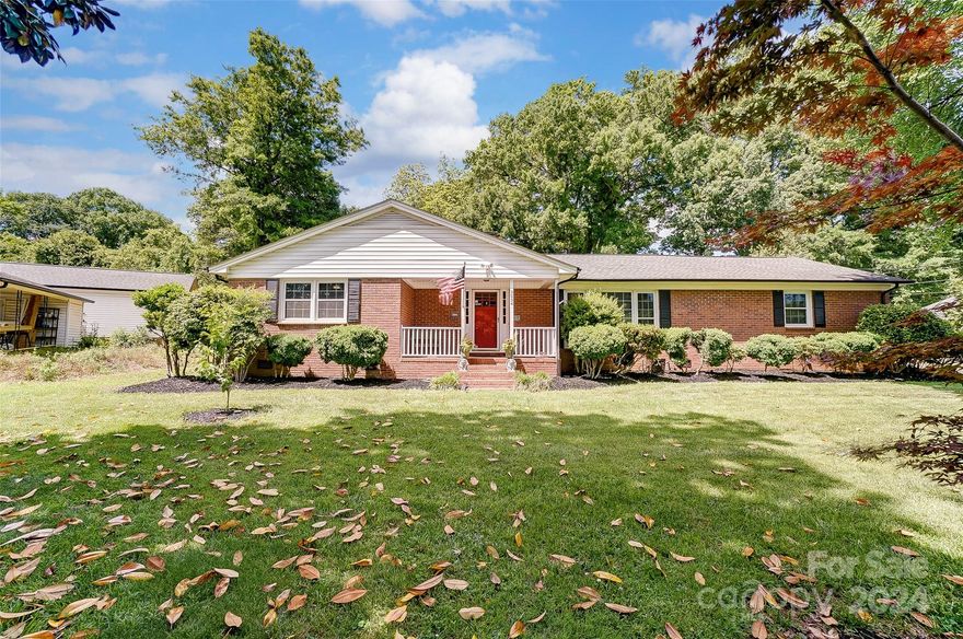 Situated in Gardner Park, mere minutes from the convenient thoroughfares of I85 and Hwy 29/74, this updated brick ranch beckons you to explore its interior delights. Step inside to discover a modern kitchen boasting updated cabinets, sleek granite countertops, and a stylish backsplash. Enjoy casual dining in the breakfast area adjacent to the open den, complete with a cozy fireplace insert. The remodeled baths exude contemporary elegance. Recent upgrades including new windows in 2020, a Riannai tankless water heater in 2020 (warrantied until 2026), HVAC replacement in 2015, and whole house plumbed in 2020 (warrantied until 2030). Generously proportioned bedrooms offer comfort and tranquility. Outside, a fenced backyard awaits, featuring two workshops (both wired and one heated and cooled) and an oversized two-car carport with a sizable storage room. Pull down stairs lead to more storage in the partially floored attic. Don't miss the chance to make this remarkable property your own.