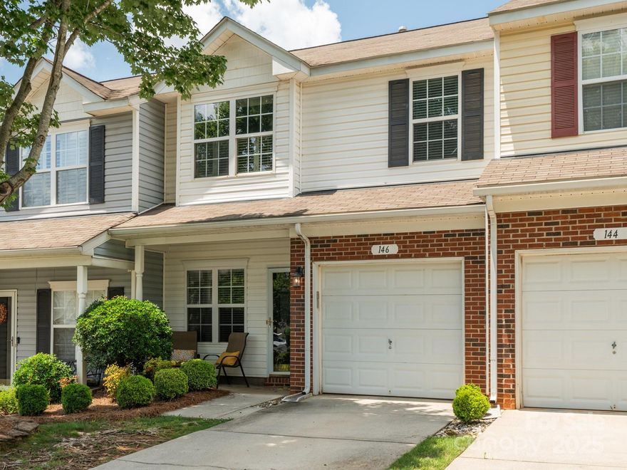 Welcome to this beautifully updated 2-bedroom, 2.5-bath townhome with a spacious loft—perfect as a home office, guest area, or flex space. Located in the heart of Fort Mill, you’re just minutes from I-77, dining at Kingsley,  strolls through Baxter Village, and local favorites like The Peach Stand.

Inside, enjoy move-in-ready comfort with fresh paint, brand-new kitchen appliances, and included washer and dryer. Durable laminate flooring runs throughout the main living spaces, with plush new carpet on the stairs.

Start your mornings or wind down your evenings on the private back patio, complete with a motorized awning and a peaceful view of a mature maple tree. There's also a welcoming front porch and views of the neighborhood pool.

Additional features include a one-car garage with built-in storage and an HVAC system updated in 2022. Available for a quick move-in. HOA covers water, trash, and lawn maintenance.