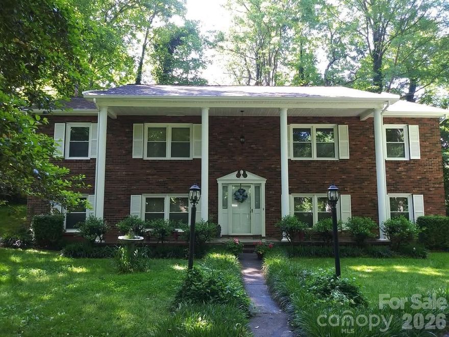 3065 Woodstream Drive (Ramblewoods). Don't wait to see this wonderful Brick home located in a cul de sac.Relax on the 12x12 screen porch in Summer n Spring. Kitchen features custom built cabinets with Granite Quartz counter tops,deep black granite sink, and tumbled tile back splash. All stainless steel appliances stay with home. The pre-finished 3/4"hardwood oak floors are in hallway,kitchen,dining room and family room with fireplace that has gas logs.Tank is owned by seller and does convey.Most of the light fixtures are new.Has 3 full baths 2 up and 1 down.Lower level has a 20x40 room used as a bedroom/den for an older adult child. Could be a family room or living space for an older parent.It does have a flue, never used for a wood stove. Home has all new life time windows in 2023. Newer roof-2013 & 2025. New water line to home 2024,Gutters in back 2025 and more... Selling as is where is no guarantees.This is a one owner custom home built as their last and forever home. Offering a 1 year American Preferred Home Premiere Warranty. Owner is a REALTOR®.Cable is Spectrum,Broadband is available.Don't wait to see this beauty.