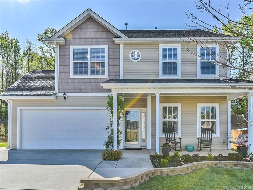 Charming Beauty from the Southern Front Porch to the Back Shade Gazebo. Nice size, level, fenced yard that backs up to wooded green space! Open floor plan. Kitchen with rich cabinetry & bar. Study or 5th BD. Lovely Master w/ garden tub, shower & walk-in closet. Keypad front door entry. Storage Shed. Neighborhd playground. Relax at home on your very own porch swing & grill out with friends in your back Patio & Deck. Fabulous location between Ballantyne & Ft Mill w/lots of shopping & restaurants.