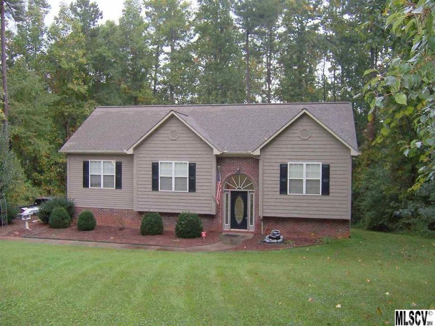 Beautiful 4 BR 3 BA home with many upgrades.  Kitchen with granite counter tops, tile floor & back splash, stainless appliances. Open living areas with hardwood flooring.  Master suite with his & hers walk in closets.  Popular split bedroom floor plan on main level.  Fourth bedroom or den/playroom/recreation area & full bath in basement.  Stainmaster carpet in bedrooms.  Tile flooring in baths, lots of storage!  Backs up to wooded acreage.