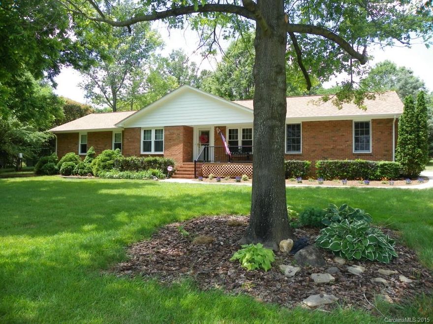 !!! CAROLANDO ALL BRICK RANCH !!!  Almost 2100 Sq Ft of Living Area + One Acre Lot / 3-Season Sunroom with door to Patio + fenced area of the backyard / Side-load Oversized 2-Car Garage + Storage area / Front Porch / Wood floor entry to Den & Office / Eat-in Kitchen / Den with masonary FP with doors to Sunroom / Laundry Room has cabinets / Exterior eaves wood has been replaced with fiber cement 5 years ago + New Roof 3 weeks ago / Storage Building / Front irrigation & flower beds / Home Warranty