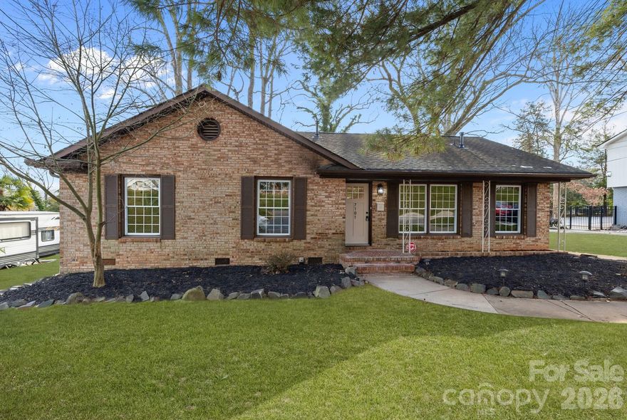 Back on market no fault of seller!  Beautifully renovated 1963 brick ranch in the highly desirable Starmount community of Charlotte.  This 3 bedroom, 2 full bath home blends classic charm with modern upgrades throughout.  Step inside to find brand-new luxury vinyl plank flooring, fresh updated lighting, and new hardware that gives the home a clean, contemporary feel.  The completely updated kitchen features new quartz countertops and backsplash, a new center island, and brand new stove and dishwasher-perfect for both everyday living and entertaining.  The spacious living area is bright and inviting with new flush-mount lighting.  Both bathrooms have been fully renovated. The secondary bath offers new and updated tile surround, new vanity, toilet, mirror, and light fixture. The primary bath features a sleek glass shower enclosure, new vanity, mirror and updated lighting. Additional upgrades include a new HVAC system, new front door, and a large laundry space with stylish barn doors. Outside, enjoy an oversized backyard with a private patio enhanced by solar-powered lighting ideal for relaxing evenings or entertaining guests.  Located in one of Charlotte's most established neighborhoods, this move in ready home offers timeless brick construction, modern finishes and unbeatable convenience to shopping, dining, and Uptown. Walkable to Stairclaire Recreation Club and access to Little Sugar Creek Greenway.