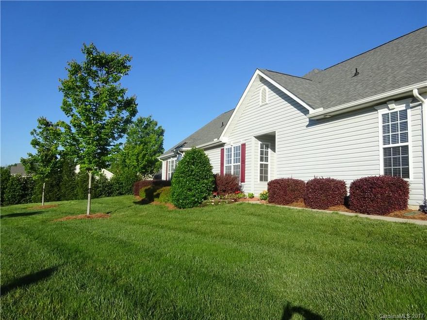 Amazing end unit in active 55+ community! Home is in immaculate condition & has great natural lighting. Wood floor in entry, DR, hall & Great Room. Master w/ huge bath boasting separate tub/shower & dual vanity. BIG walk-in closet. Lg bdrm on front of home w/ private bath & walk in closet. Den/office has closet (no window) but can easily be used as guest room. Kit is open to GR w/ ample cabinet & counter space. Bay window in breakfast nook is a nice upgrade. GR w/ vaulted ceiling. Upgraded fans.