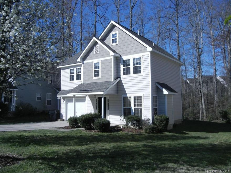 WOW!  Clean and move-in ready!  This three bed, two & a half bath home has just been painted throughout and professionally cleaned for the new owner.  Great starter home and priced to move!  Make sure to check out the pictures.  Back yard & deck overlook wooded area.  Just reduced to $108K!