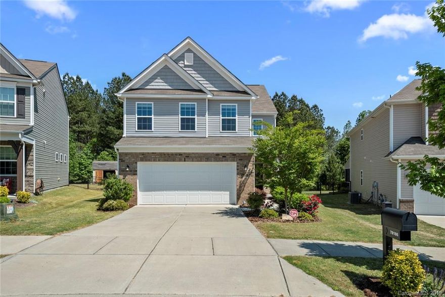 Welcome to this adorable home in the Walnut Creek neighborhood in Lancaster, SC; just a short drive from the new shopping center and growing Indian Land, SC! This home has many notable features, some of which include: two story foyer; hardwood floors; open floor plan between the living room, kitchen, and dining area; gas log fireplace in the living room; and lots of natural light. The chef's kitchen has granite counter tops, a tile back splash, plenty of cabinets and storage options, and stainless steel appliances. Upstairs is the over-sized owner's suite which features an ensuite bathroom with garden tub, tiled shower, dual sinks; and a large walk in closet! Two large bedrooms share a full bath, and another bedroom has a private full bath attached. Enjoy time on the back patio which overlooks a private and fully fenced flat backyard! We love the resort style amenities in Walnut Creek! Make this house your home today! Ask us about our Zero+ Mortgage plan.