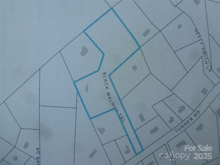 4.42 Acres of privacy with 2 septic systems on the property.  The condition of the septic systems are unknown.  There are 2 old mobile homes that are not livable that would need to be removed.  A paved road in and paved driveway.  There are currently no signs on the property.  A great opportunity!