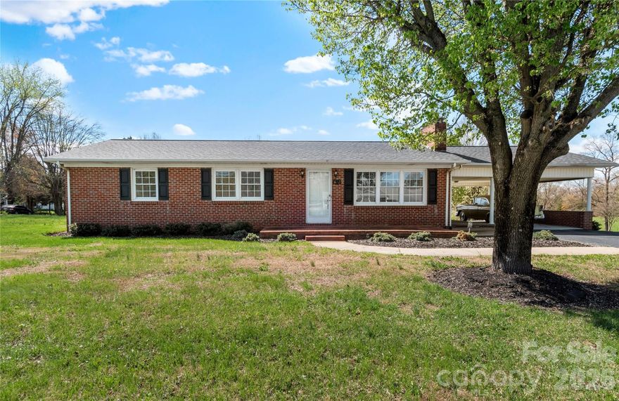 Motivated Seller. Welcome to this well-maintained 3-bedroom, 1-bathroom brick ranch on approximately 0.47 acres +/-, offering a comfortable layout and great functionality. The home features a spacious living room with a fireplace, a separate dining area, and a dedicated kitchen space with easy flow for everyday living. The unfinished basement provides excellent storage or potential for future expansion or finishing. Outside, enjoy a paved driveway, carport, and a separate detached garage, offering plenty of parking and workspace options. With a manageable yard and practical features throughout, this property is a great opportunity for anyone looking for both comfort and potential.