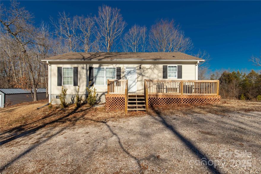 Oh my, this charmer needs to be moved to the front of your list to see!  Tucked in on 5 1/2 acres, there's room to explore and create your outdoor adventures!  Whether it's your morning coffee or relaxing by the stars, that front porch is the perfect spot to take in the tranquil sounds of nature!  Stepping inside you will be welcomed by beautiful flooring, neutral colors and radiant sunlight flowing in.  Great cabinet space in the kitchen will help keep you organized and ready to cook.  Accommodating living space with 3 bedrooms and 2 full baths.  An exterior door to the laundry allows you to leave the mess behind when you come in from a day outdoors!  It's time to enjoy the peacefulness of country living and make yourself at home here.