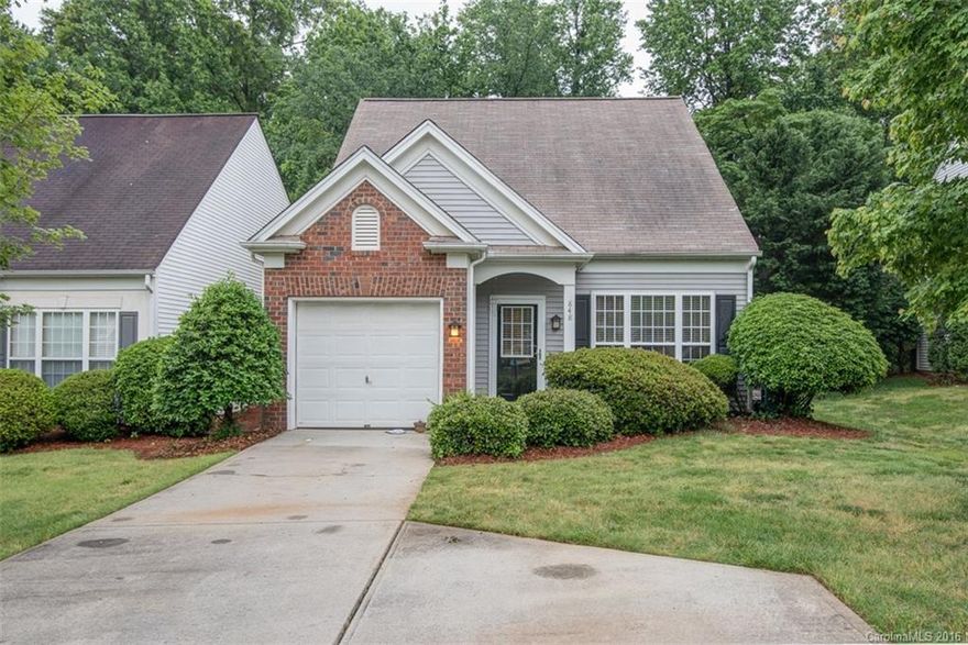 Beautiful Townhouse w/wood floors up and down. Fresh neutral paint.  New granite counters and refinished cabinetry in kitchen. Vaulted ceiling and gas log fireplace in LR. Owner's Suite downstairs with triple window.  Private patio with lovely yard, raised bed garden and fruit trees!.  Fabulous location near light rail and Park Rd.  Looks and feels like single family.  One car garage.  Includes refrigerator and washer/dryer (as is).  Seller used low VOC paint and upstairs hardwoods are low VOC.