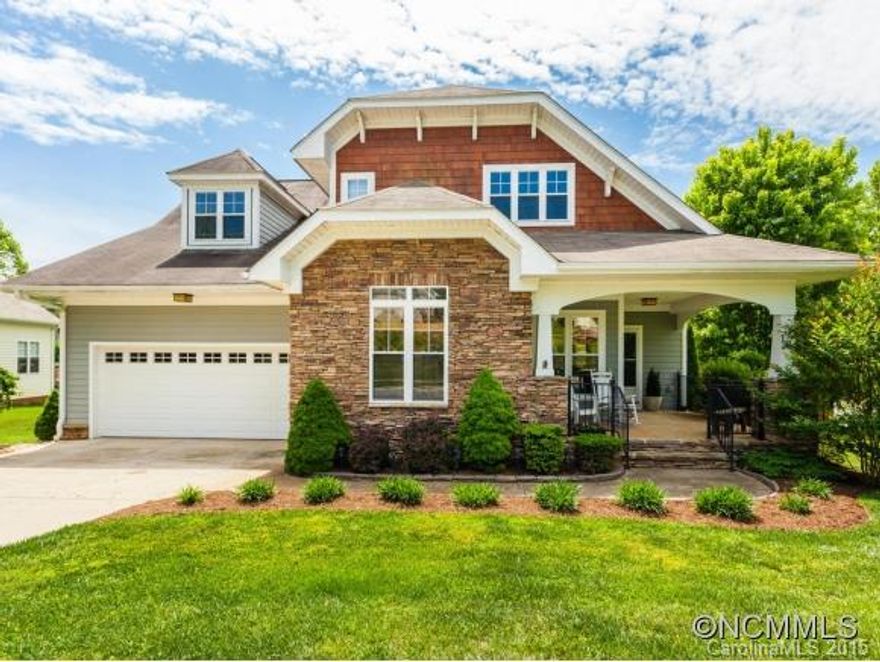 Don't miss this beautifully maintained craftsman home on large lot with covered front porch overlooking the community park. The open plan has soaring ceilings, hardwood floors and master on main. The kitchen has granite counters, stainless appliances & sunny breakfast room. Back yard living includes a stone patio, decking, bridge over bold creek & privacy fencing. 3 additional bedrooms and 2 full baths up with large bonus/family room upstairs.