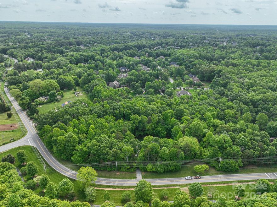 Beautiful property in the highly desired Marvin area with two parcels around 5.85 acres. Entire property has to be sold together. All utilities are on site and sewer is approximately 300 feet per Union County. Existing home on the property is connected to well water and septic system.