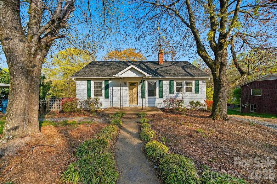 Located at 2036 4th Street NE in Hickory, NC, this thoughtfully updated home offers a rare combination of modern improvements, generous outdoor space, and functional versatility. Situated on approximately 0.56 acres, the property provides room to enjoy outdoor living while remaining conveniently positioned near everyday amenities, employment centers, and major roadways.

Inside, the home features approximately 900 square feet of well-designed living space with two bedrooms and one full bathroom. Over the past few years, numerous updates have been completed, creating a move-in-ready environment while preserving flexibility for future customization. Durable luxury vinyl plank flooring runs throughout the home, complemented by fresh interior paint that creates a clean and welcoming atmosphere.

The living room offers a comfortable gathering space enhanced by a ceiling fan for added comfort. The kitchen has been updated with an electric range and stainless steel refrigerator, providing both function and modern appeal. A dedicated dining area opens directly to the rear deck, creating a natural flow for everyday living and easy access to outdoor space.

Both bedrooms are well-proportioned and filled with natural light, while the full bathroom is centrally located for convenience. The home also includes a full unfinished basement, offering abundant storage and future potential. The basement includes laundry hookups and can easily accommodate hobby space, storage needs, or long-term planning for additional finished areas.

A new front door enhances curb appeal, while French doors connect the interior living space to the backyard, bringing in natural light and expanding the usable footprint of the home. A carport provides covered parking, and a separate workshop adds valuable utility for tools, projects, or additional storage.

One of the most significant updates includes new plumbing from the road to the home, delivering long-term peace of mind and reducing future maintenance concerns. Combined with newer flooring, appliances, and finishes, these improvements create an attractive option for buyers seeking reliability and efficiency.

With its sizable lot, recent upgrades, and adaptable spaces, this property presents strong appeal for a variety of ownership goals — whether as a primary residence, a simplified living option, or an investment opportunity. The combination of indoor updates, outdoor amenities, and location within Hickory makes 2036 4th Street NE a compelling choice for buyers seeking value, functionality, and future potential.