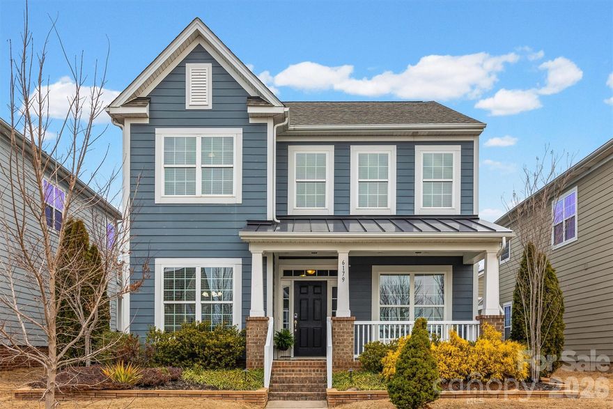 Ideally located in the heart of Tega Cay and just minutes from Fort Mill, this beautiful home offers access to top-rated schools and the benefit of low South Carolina taxes. Enjoy close proximity to I-77, dining, shopping, and entertainment. All while being tucked away on a desirable street in the center of the neighborhood, just a short walk to the community pool. Designed for both everyday living and entertaining, the kitchen features a large island with built-ins, abundant cabinetry, granite countertops, stainless steel appliances, ceramic-top range, and a butler’s pantry. Kitchen is open to the breakfast area and family room. Natural light fills the home throughout. The main-level study is enhanced with French doors and custom built-in cabinetry, creating the perfect private workspace.
The spacious primary suite offers a tray ceiling and a beautifully newly renovated spa-like bath, complete with an enlarged shower and custom wood vanity. Upstairs, you’ll find two additional bedrooms, brand-new carpet throughout the entire upper level, and a generous loft area that can easily be converted into a fourth bedroom.
Step outside to your own private retreat. The fenced backyard features retaining walls, a gorgeous patio ideal for entertaining, and professional outdoor lighting with a timer that enhances the ambiance and creates a true courtyard feel with wonderful afternoon shade. The detached, oversized 22’ x 24’ rear-load two-car garage provides ample space for vehicles and storage. Great Location and Beautiful Home!!!