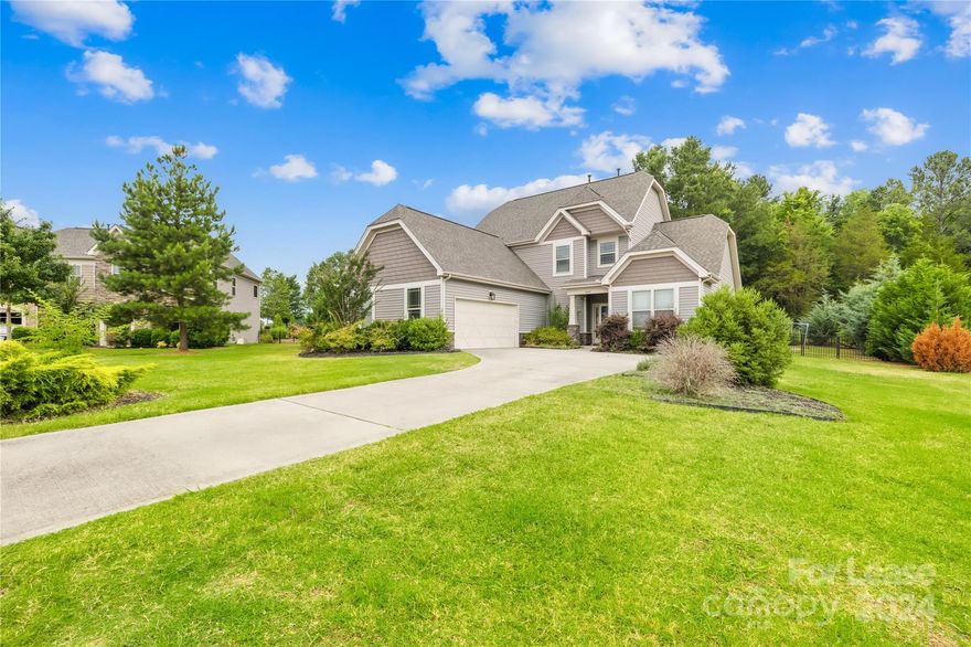 This single-family home, built in 2014, features a master bedroom on the main floor, 4 bedrooms, 2.5 bathrooms, and 2604 sqft of living space. It includes a 2-car garage with extra storage and a large fenced yard, and is available now! The first floor boasts an open floor plan with a 2-story foyer, a family room with a stone surround fireplace, a kitchen, a breakfast area, a half bath, laundry, and the master bedroom with an ensuite bathroom. Upstairs, you'll find three additional bedrooms, one bathroom, and a loft.

Community amenities include a clubhouse, outdoor pool, playground, and tennis courts. The community is served by top-rated schools and offers easy access to Rocky River Rd, I-485, Harris Square shopping center, Farmington, UNCC, and Concord Mills Mall.

Rent includes the refrigerator, washer, dryer, and HOA fees. Tenants are responsible for water, gas, electricity, internet, and lawn maintenance.