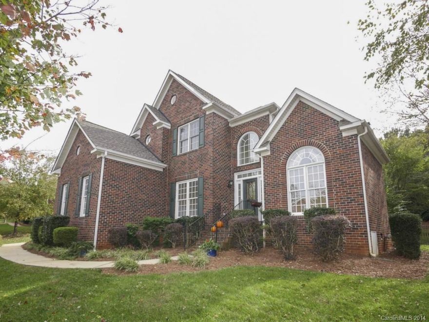 All brick, 3-car garage, meticulously maintained, guest BR on 1st flr w/full BA. Large kitchen open to the family room w/vaulted ceiling. Lots of hdwds, new carpet, new paint, updated fixtures, new roof 2011, new down A/C 2012, newer tile in baths, aluminum fencing, irrigation, security system. Lots of walk-in attic storage. Award-winning schools, many wonderful amenities nearby.