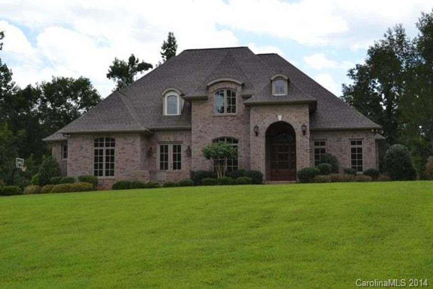 Beautiful brick home has tons of living space!  Truly a pleasure to show!  Formal living room and dining room, great room with fireplace/gas logs and built-ins.  Gorgeous kitchen with solid surface counter tops, tile back splash and breakfast bar.  Huge master with tray ceiling and 2 walk-in closets. There is also an office on main level with a private courtyard!  Large bonus room upstairs with a wet bar.  Screen porch and deck!