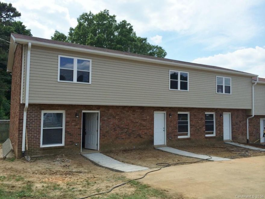 This town home has been completely renovated! Everything is new, from the carpet to the paint to the fans and fixtures to the appliances. Stackable washer/dryer hookup. Tenant responsible for all utilities except lawn care. Two reserved parking spaces. This location is minutes to I-77, I-85 and Statesville Ave, and within walking distance to schools, churches and city transportation. Sorry, no pets please. NOTE: Photos shown are of a model unit with a similar floor plan and finishes.