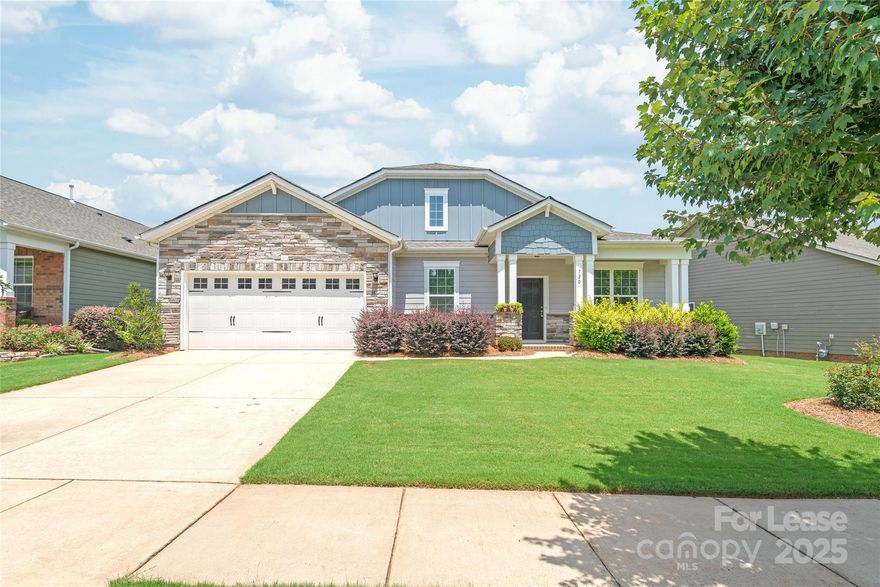 Located in the sought-after Belmont area, this beautiful 3-bedroom, 2-bath ranch-style home offers an open floor plan with dark hardwood flooring throughout the main living areas. The spacious kitchen features granite countertops, custom cabinetry, a large center island, and stainless steel appliances, including a gas range and double oven. The living room centers around a cozy gas-log fireplace, creating a warm and welcoming space. The primary suite includes a generous walk-in closet and a luxurious en-suite bath with a designer walk-in shower (featuring dual shower heads) and a relaxing garden tub. Two additional bedrooms offer ample space and comfort with plush carpeting.

Just off the foyer, a private study with French doors provides the ideal home office or flex space. Step outside to enjoy a covered patio overlooking the backyard.

Additional highlights include a tiled laundry room and access to fantastic community amenities such as a pool, fitness center, and clubhouse.