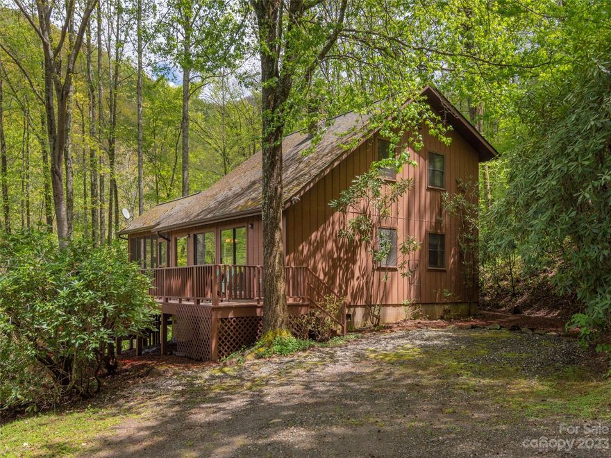 Looking for a stunning cabin with incredible mountain views? Look no further than this beautiful 1.5 story cabin in Sylva, NC! Boasting 3 bedrooms and 3 baths, each room with its own bathroom, this cabin is the perfect place for your next vacation, retirement home, or rental property. One of the standout features of this cabin is its priceless long range mountain view. Enjoy the cozy and inviting atmosphere of the wood-burning fireplace. You can relax and take in the sights and sounds of the surrounding Balsam Mountain Preserve from the comfort of your large screened-in porch. Hear the peaceful sounds of the creek running nearby. The vaulted ceiling adds to the spacious and open feel. Don't miss out on the opportunity to make this stunning cabin your own. Contact us today to schedule a showing and experience the beauty of this mountain oasis for yourself! STRs allowed.