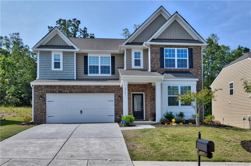 Wonderful open floor plan perfect for entertaining.Great room has beautiful gas fireplace.Spacious kitchen w/island & plenty of counter space.Beautifully upgraded w/granite countertops,tile backsplash & SS appliances. Gleaming hardwoods floors throughout most of main level.Large loft upstairs w/many use possibilities. Downstairs bedroom is perfect for in-law suite or can be 2nd master bdrm.Huge walk-in closets in the bedrooms. Stamped concrete extended patio looking into private wooded backyard.