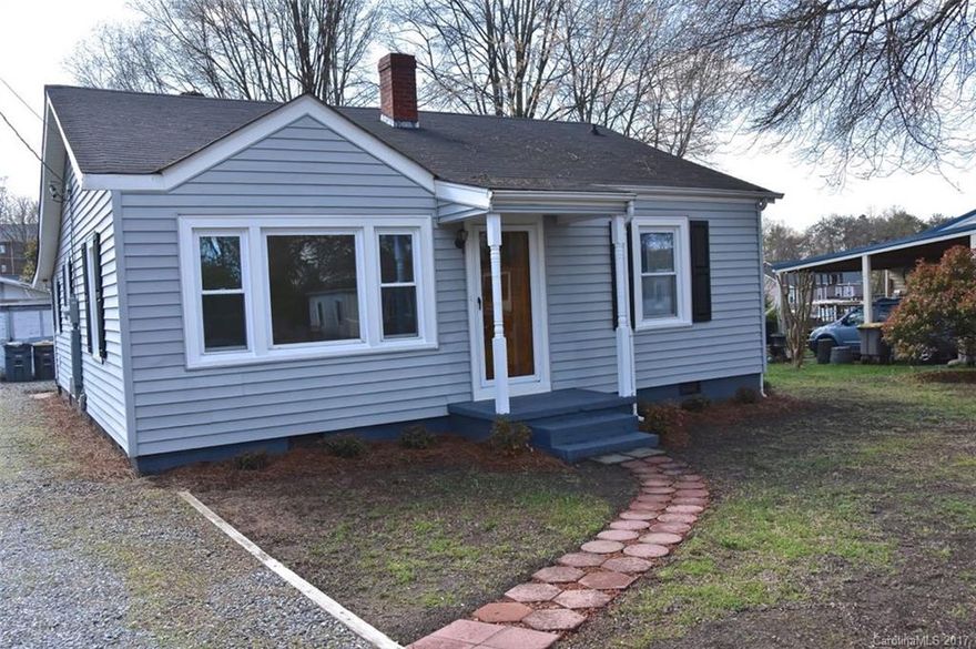 Lovely ranch home. Move in ready. Gorgeous refinished real hardwoods floors through out home. Large great room with oversized windows for plenty of natural light. New electrical 200 amp box, and recepticals. Central air, gas heat 2 years old. Roof was redone in 2013. Whole house freshly painted on interior. Master bathroom completely gutted and rebuilt. New vanity, toilet flooring and shower. Cute back porch and large yard. 1 car garage with work room in back (garage sold as is..)