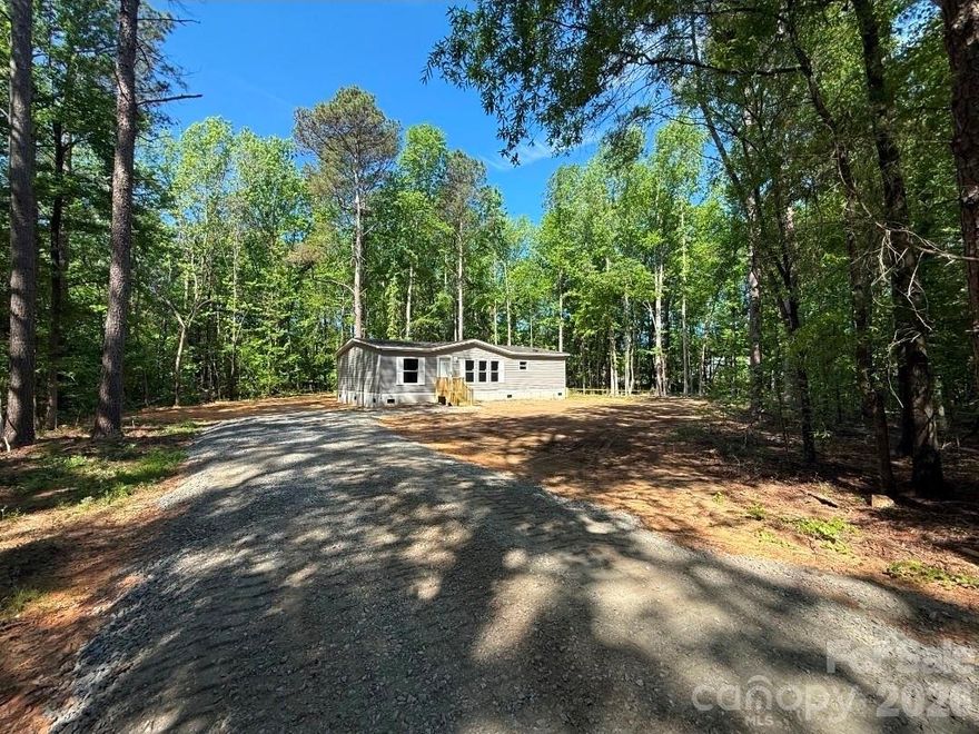 Located directly across from the Chester Regional Airport, this property offers privacy and accessibility. It is a 3.19 acre parcel that will have a brand new 3 bed 2 bath home installed. With no restrictions, this property offers the ability to be used for farming, recreation, timber, or just privacy. 5 year septic warranty and service plan included.