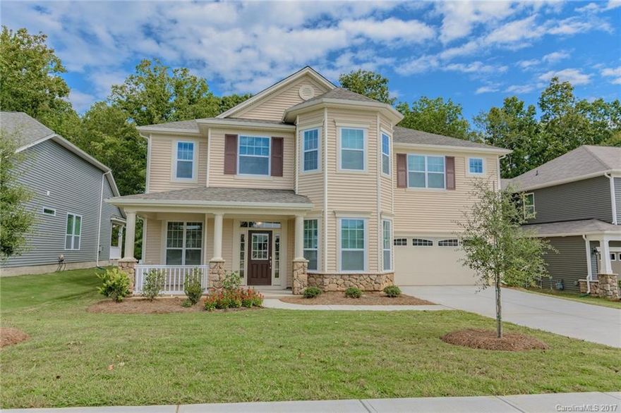 Move-In Ready Olmstead home with 4 bedrooms, 2 1/2 bathrooms, Loft and Sunroom. Two-story living room with plenty of space for everyone! Home includes hardwood flooring on 1st floor, sunroom and covered veranda overlooking a wooded back yard. Granite, upgraded cabinets, stainless steel appliances, tile, and more! Come tour this beautiful home today!